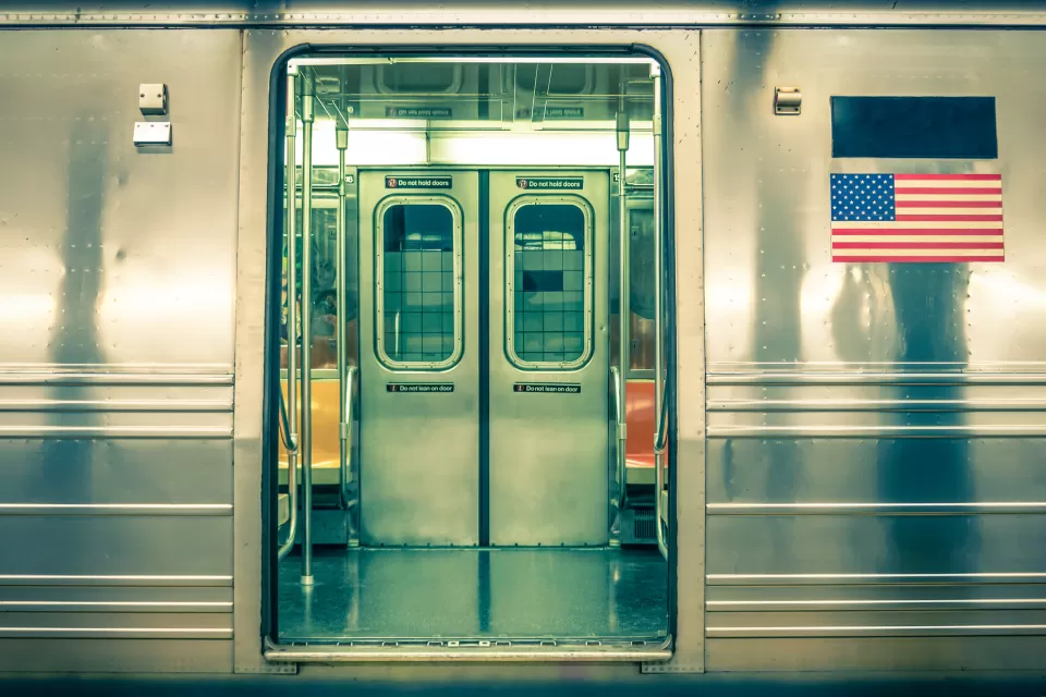 Close-up on open door to empty subway subway